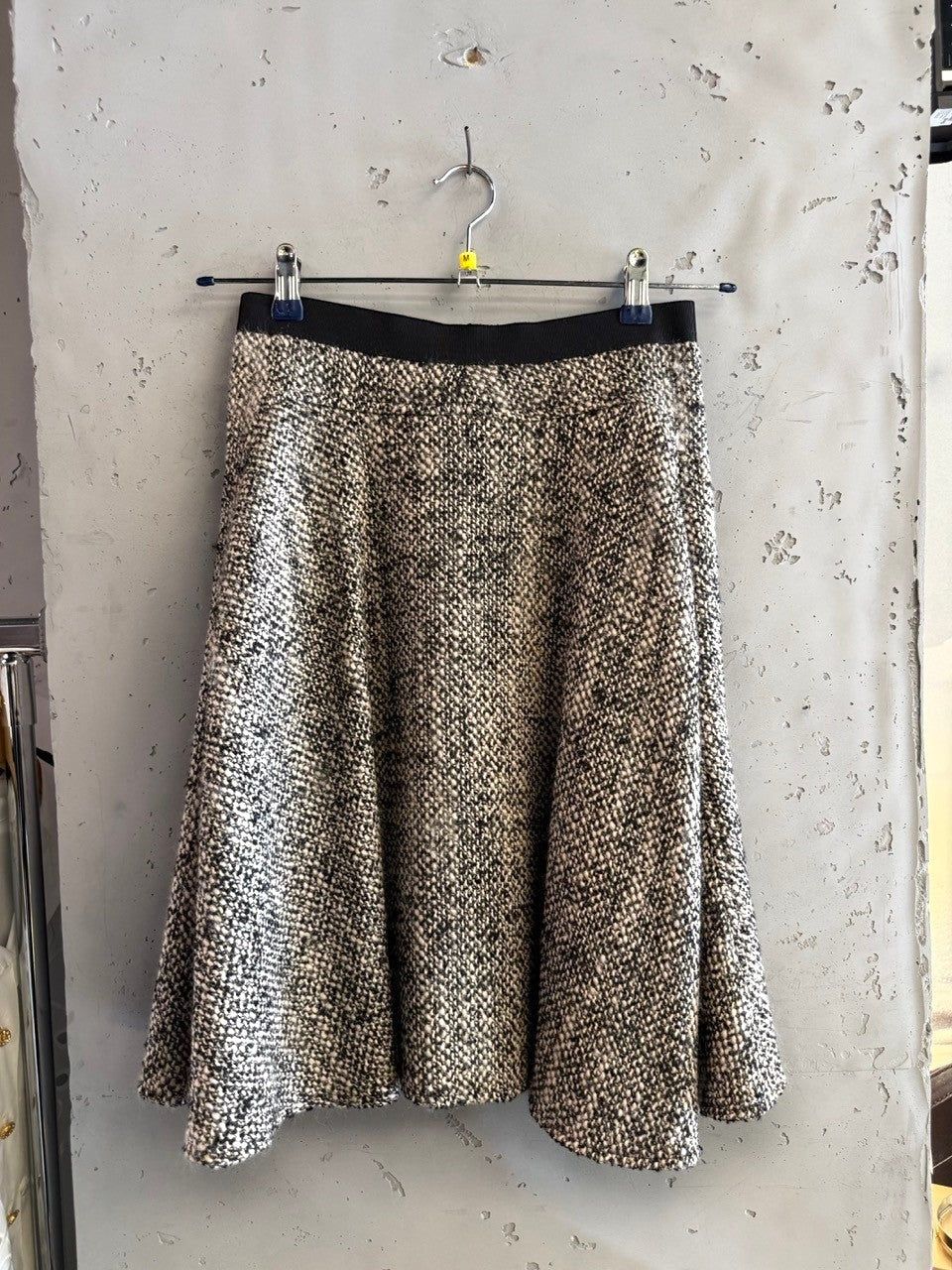 BERLIN VINTAGE CORNER black and cream marled tweed A-line skirt with black waistband.