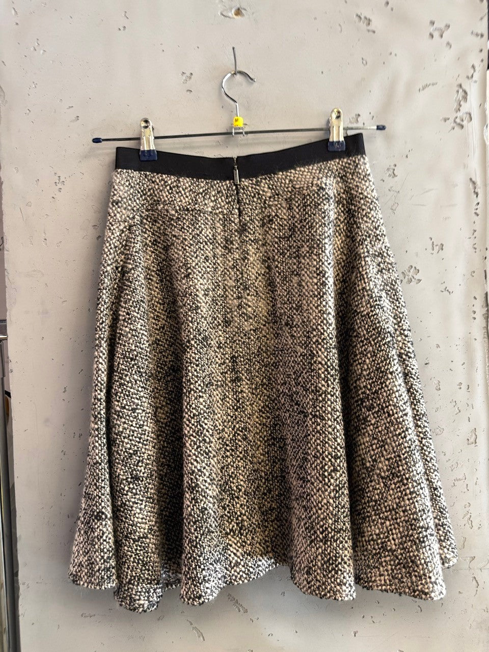BERLIN VINTAGE CORNER black and cream marled tweed A-line skirt with black waistband and back zipper.