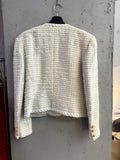 BERLIN VINTAGE CORNER cream tweed blazer with blue accents, metallic threading, and gold-tone cuff buttons.