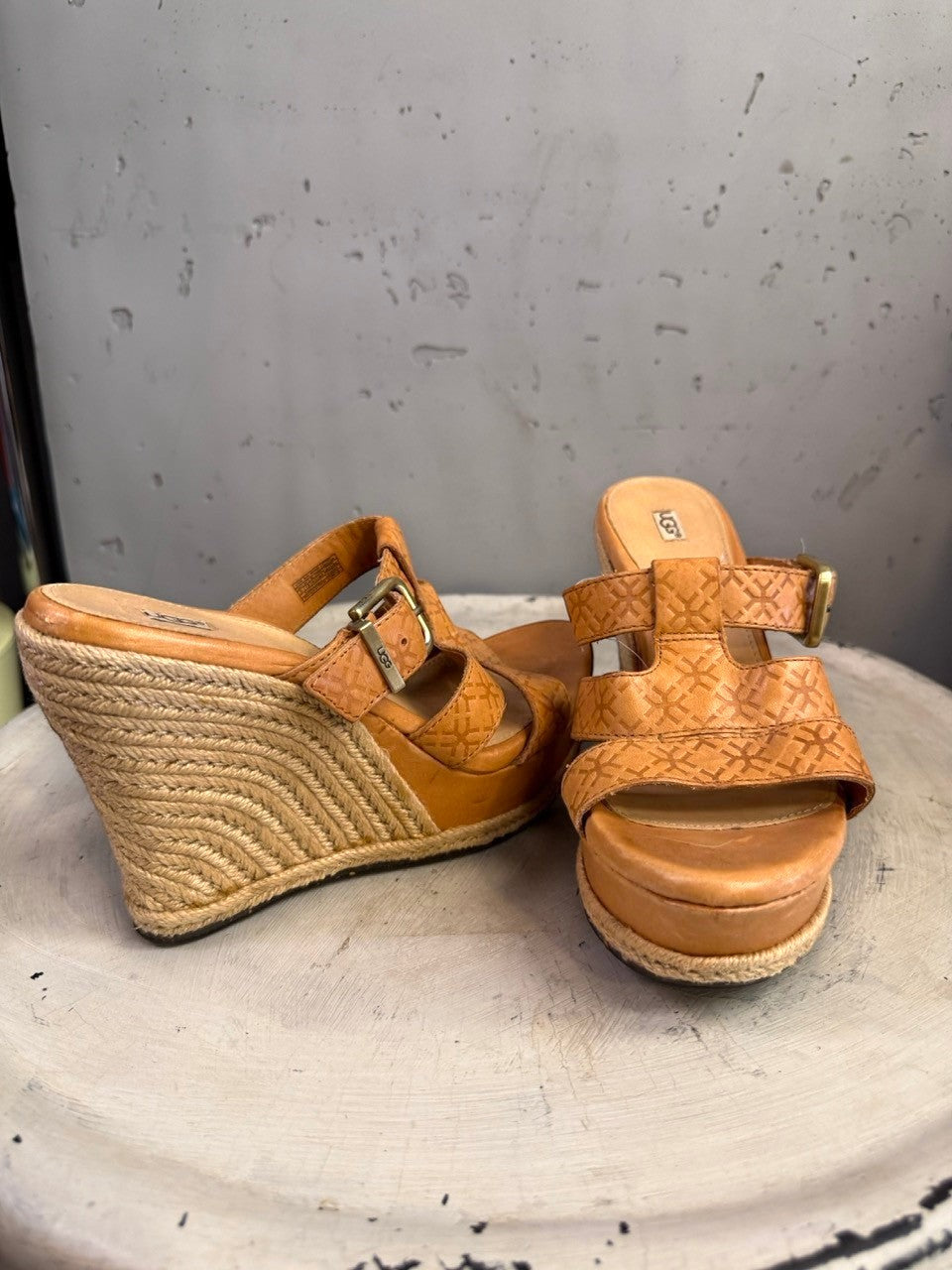BERLIN VINTAGE CORNER tan leather UGG espadrille wedge sandals with embossed straps and buckle closure.