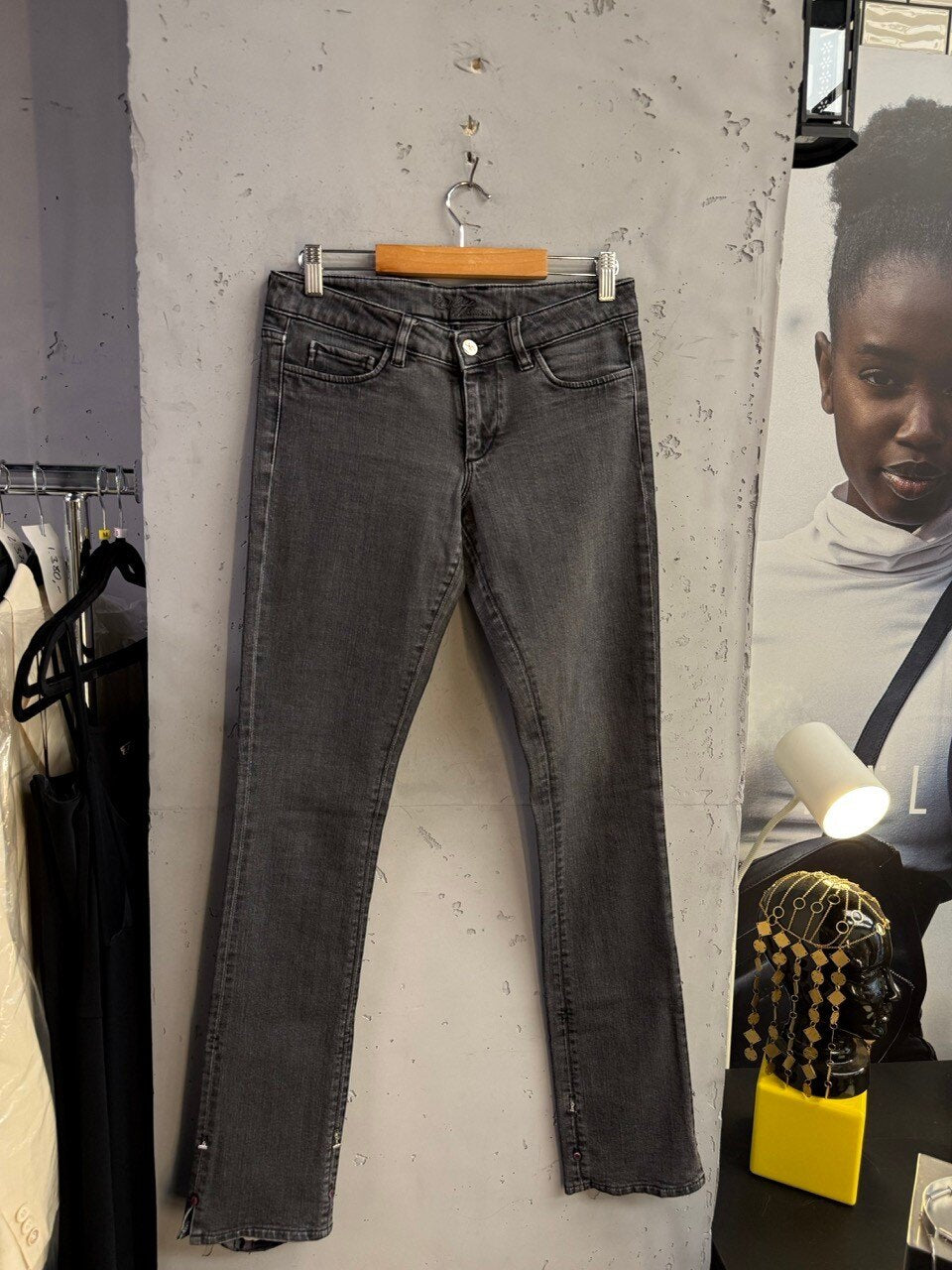 Grey skinny jeans, back view with faded seat