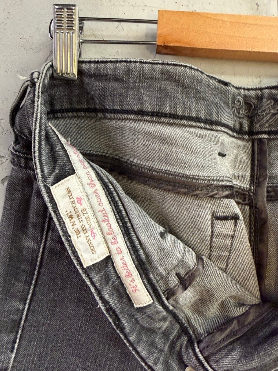 Grey skinny jeans, charcoal wash detail