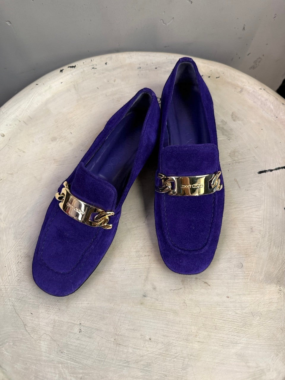 BERLIN VINTAGE CORNER Jimmy Choo deep violet suede loafers with polished gold-tone metal chain hardware on the vamp.
