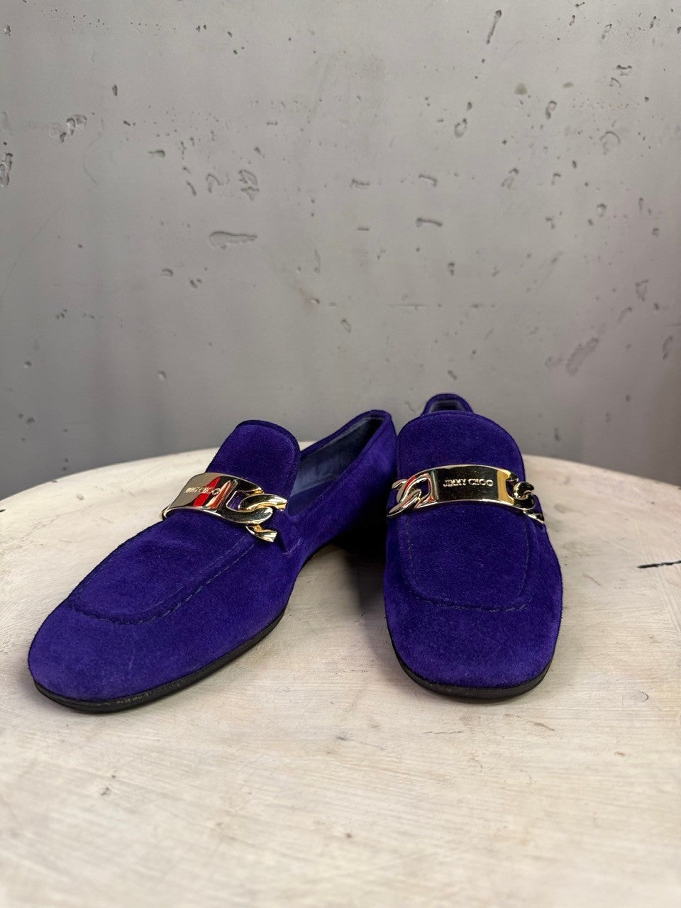 BERLIN VINTAGE CORNER Jimmy Choo violet suede loafers featuring polished gold-tone metal chain hardware on the vamp.