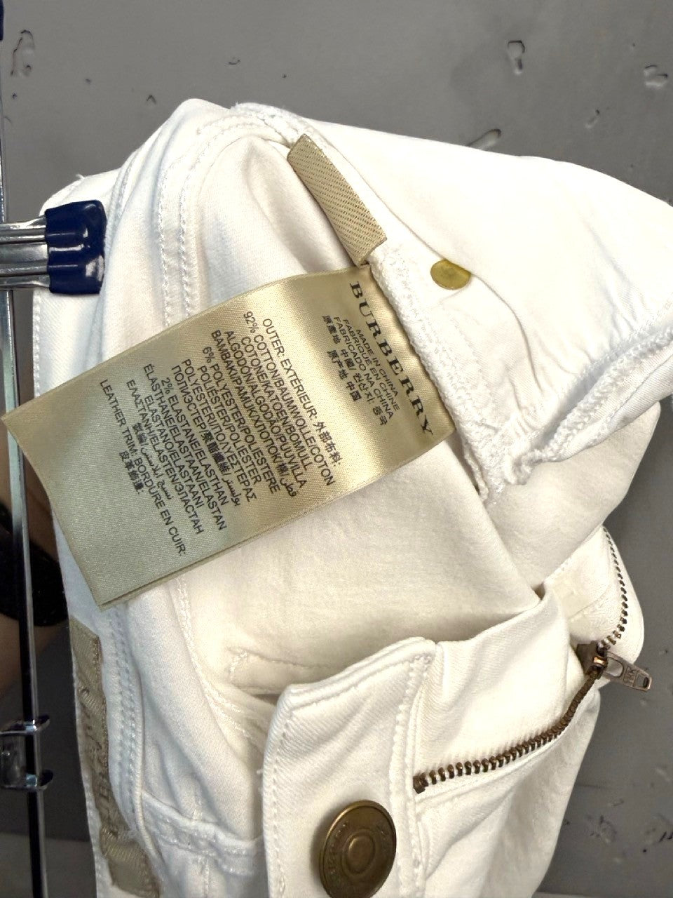 BERLIN VINTAGE CORNER white cotton denim jeans with five-pocket design and leather trim.