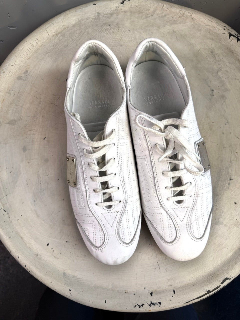 BERLIN VINTAGE CORNER white leather low top sneakers with lace-up closure and silver metal accent.