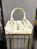 BERLIN VINTAGE CORNER white quilted leather Burberry handbag with silver hardware, padlock detail, and top handles.