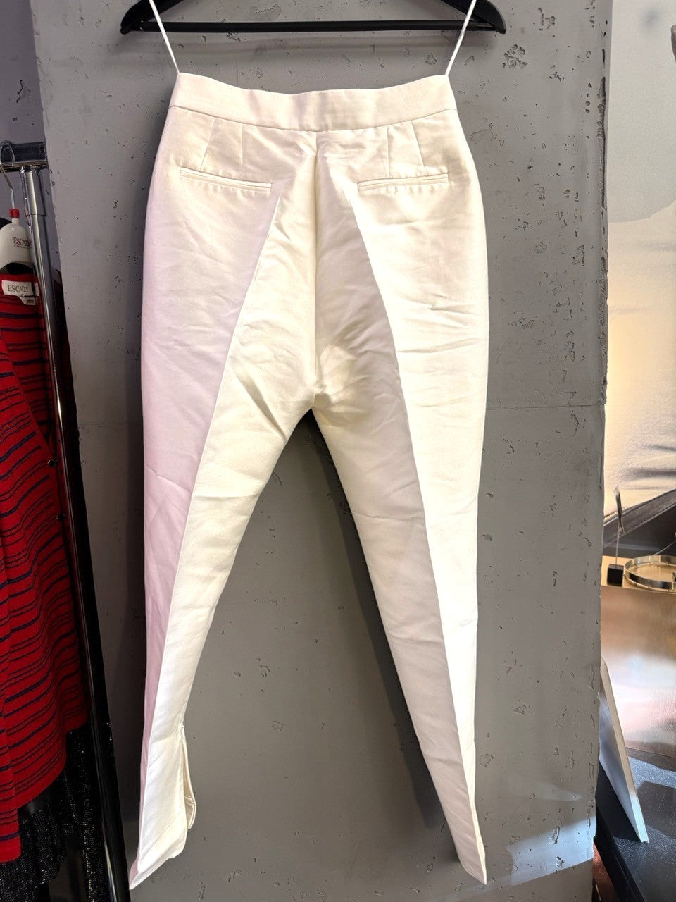 BERLIN VINTAGE CORNER white tailored slim fit trousers with back welt pockets and hem zipper details.