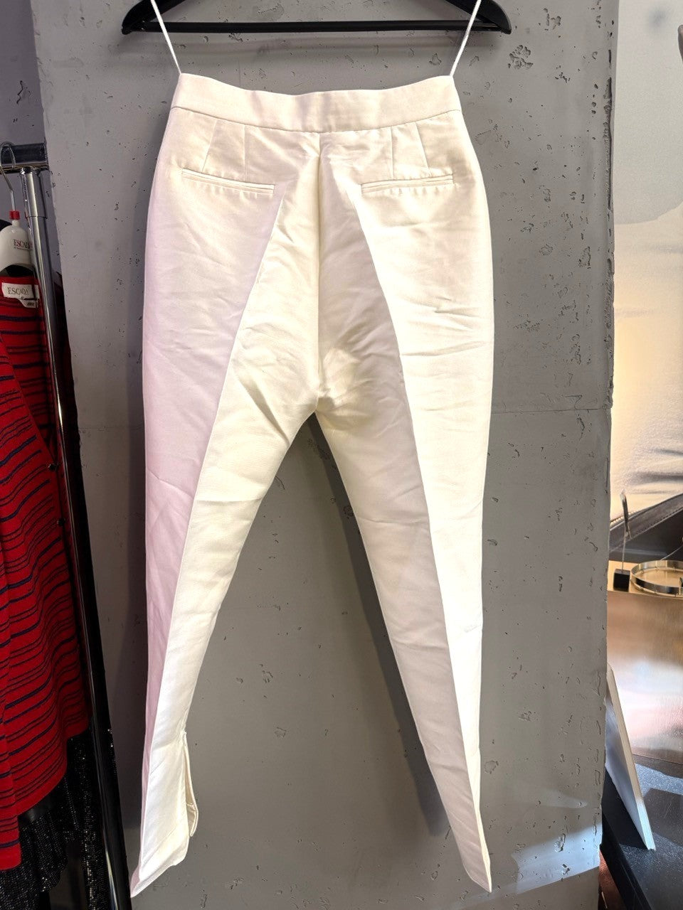 BERLIN VINTAGE CORNER white tailored slim fit trousers with back welt pockets and side-zip hem detail.