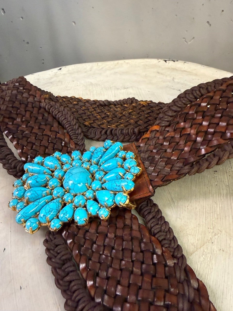 BERLIN VINTAGE CORNER dark brown woven leather belt with ornate gold-tone buckle featuring turquoise stones.