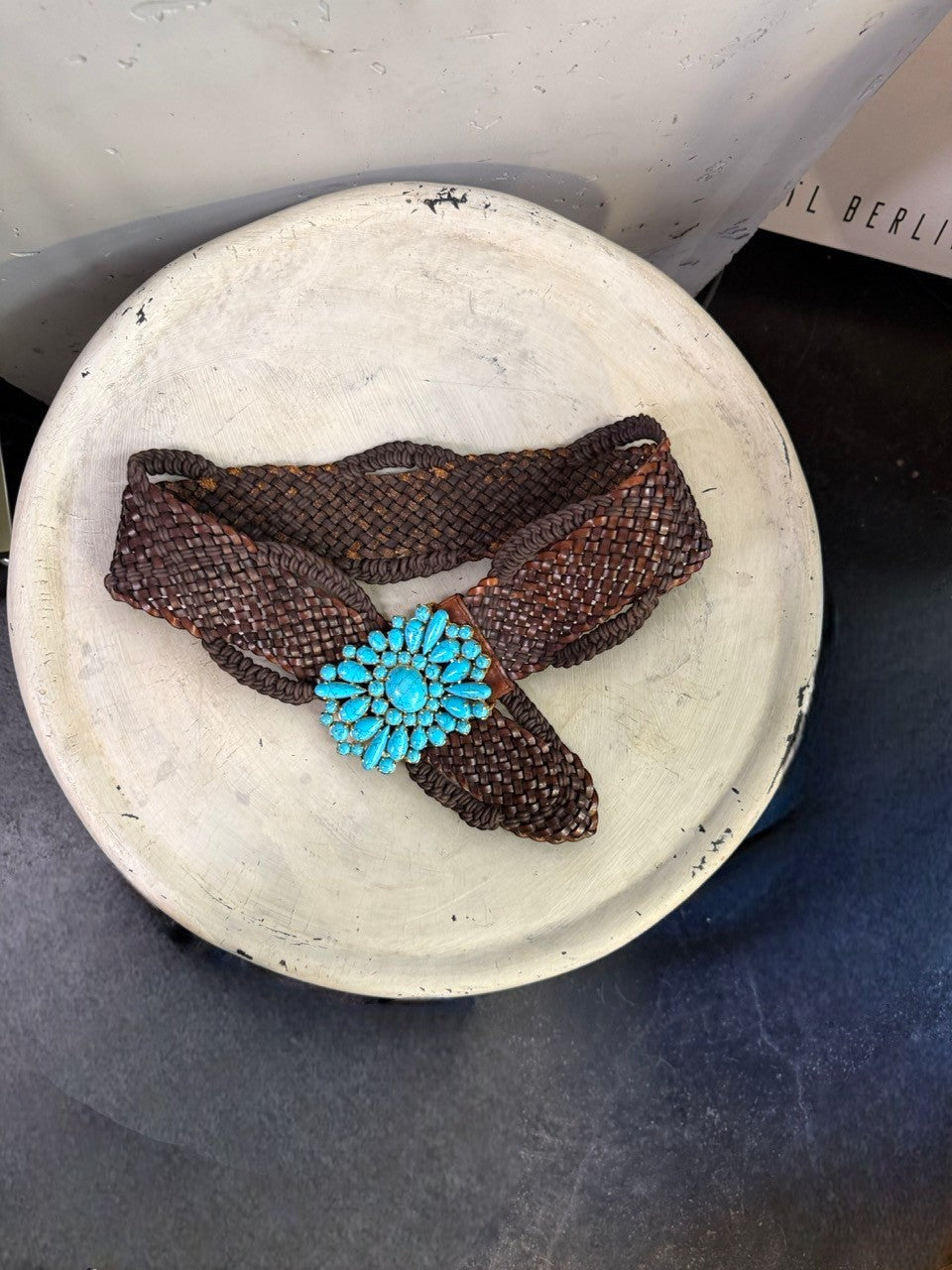 BERLIN VINTAGE CORNER dark brown woven leather belt with ornate gold-tone buckle featuring turquoise stones.