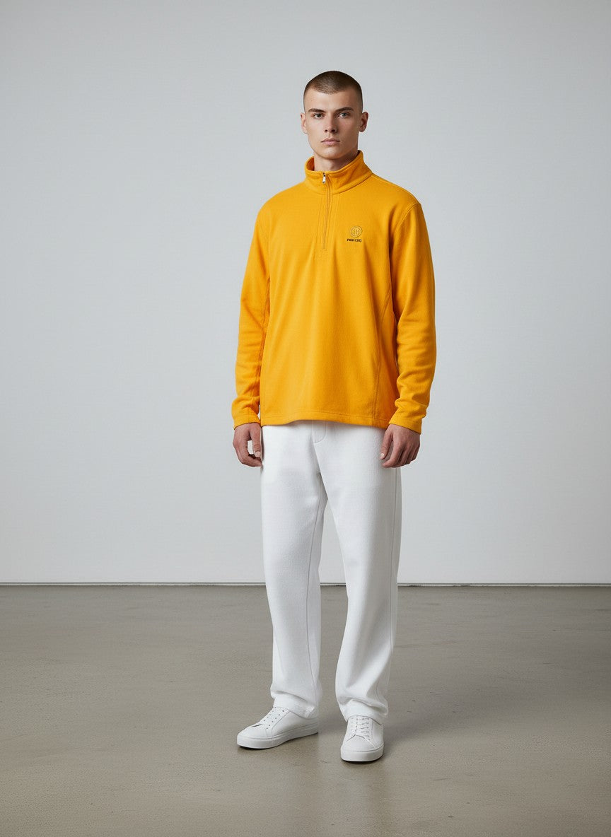 BERLIN VINTAGE CORNER yellow fleece quarter zip pullover with embroidered logo. Long sleeves, mock neck, and zip closure.