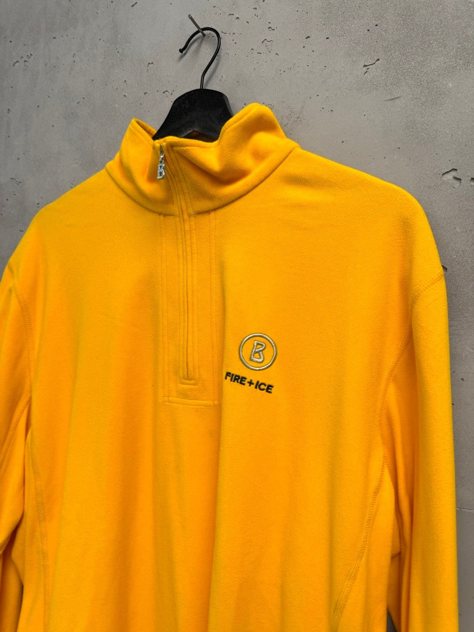 BERLIN VINTAGE CORNER yellow fleece quarter zip pullover with embroidered Fire + Ice logo.