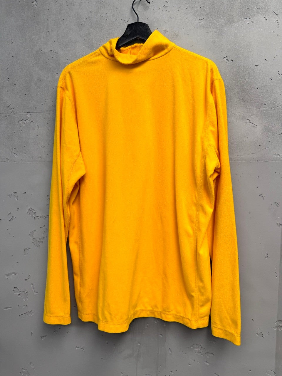 BERLIN VINTAGE CORNER yellow fleece quarter zip pullover with mock neck and long sleeves.