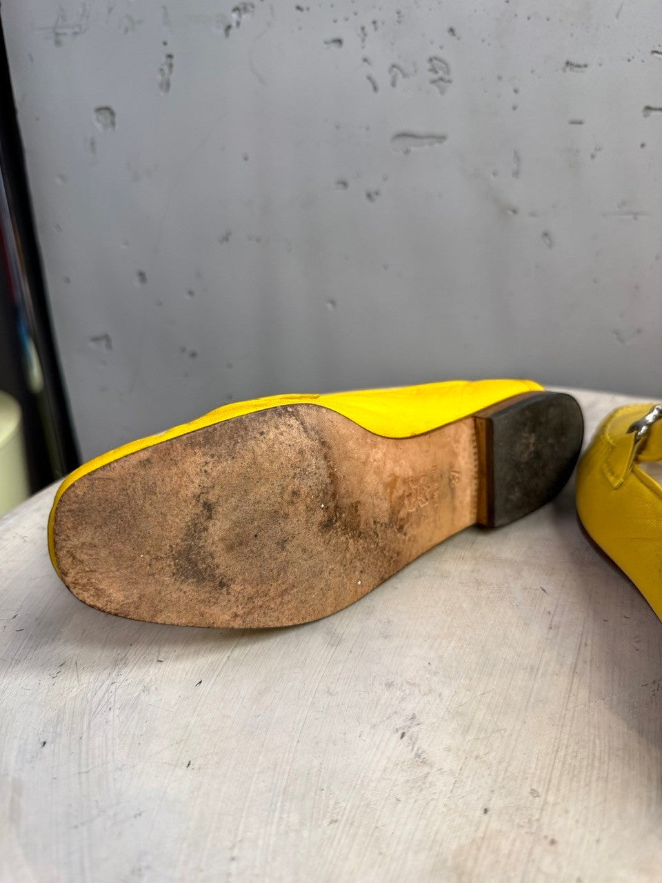 BERLIN VINTAGE CORNER yellow leather loafers with silver-tone metal accent and detailed stitching.