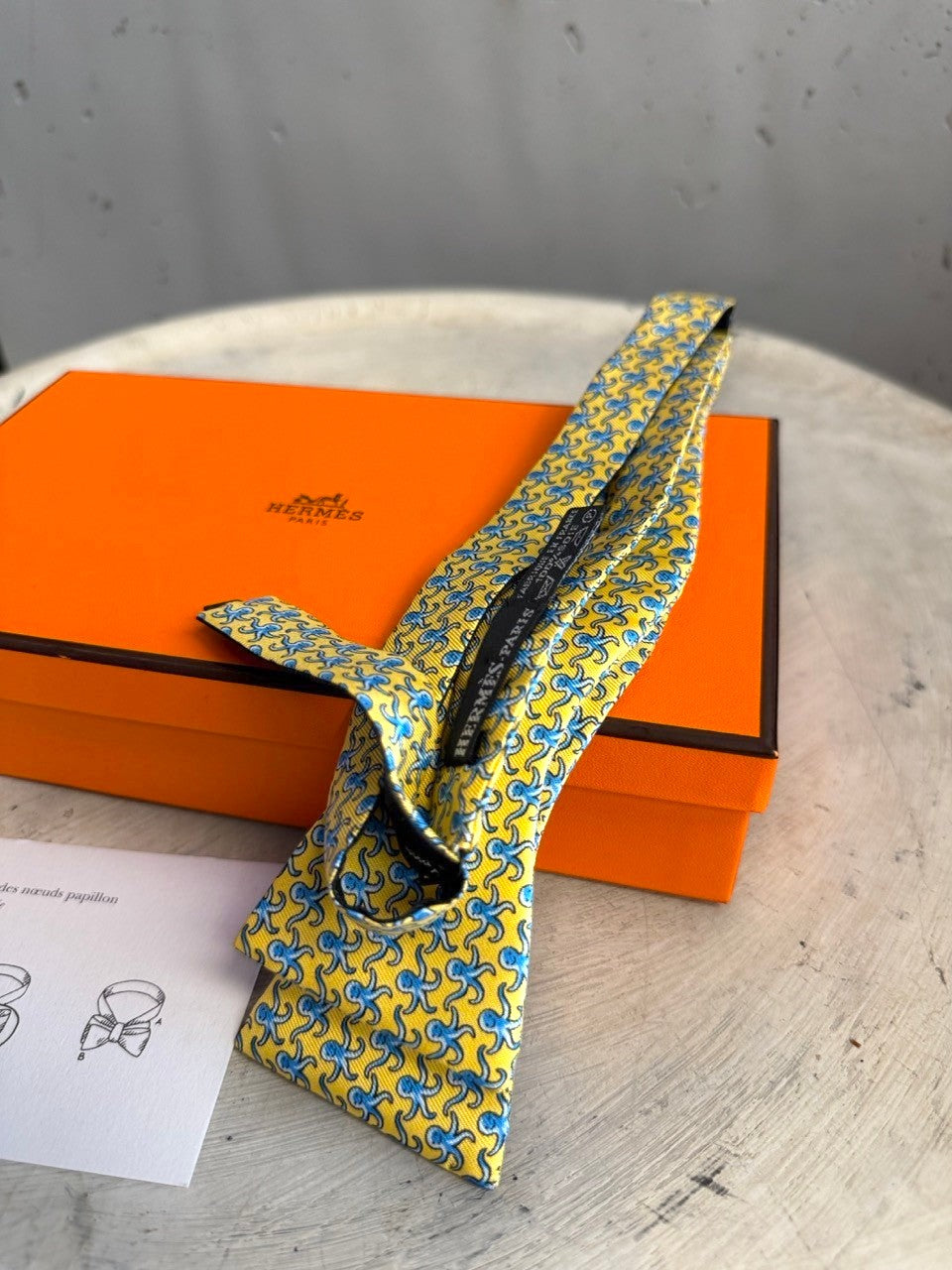 BERLIN VINTAGE CORNER yellow silk bow tie with blue octopus pattern and instructions.