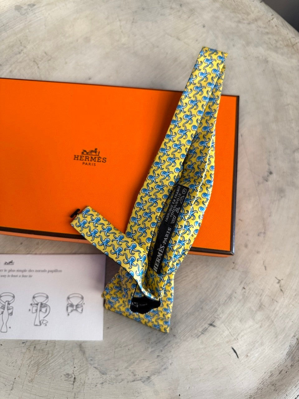 BERLIN VINTAGE CORNER yellow silk bow tie with blue octopus pattern and instructions.