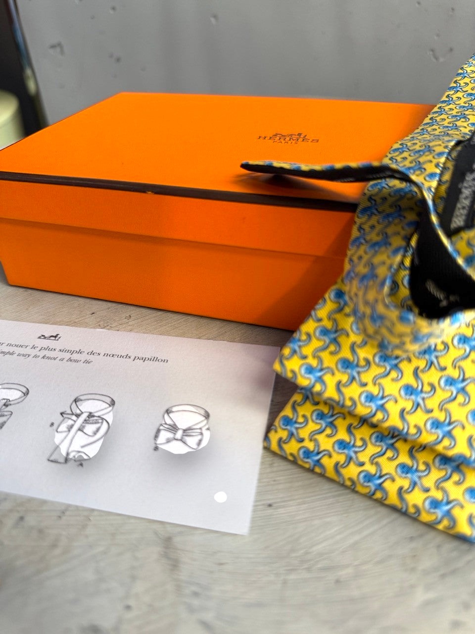 BERLIN VINTAGE CORNER yellow silk bow tie with blue octopus pattern and instructions.