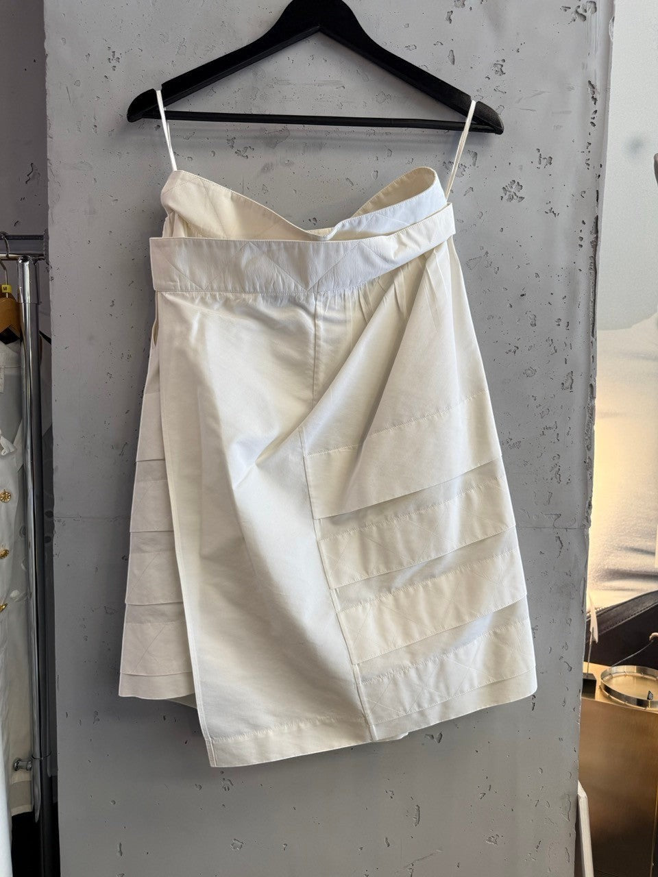 BERLIN VINTAGE CORNER off-white YSL Rive Gauche skirt with quilted waistband and black button details.