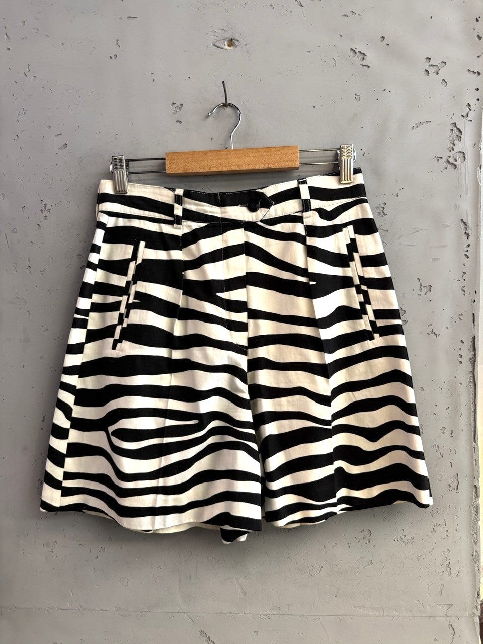 BERLIN VINTAGE CORNER black and white zebra print high-waisted pleated shorts with belt loops.