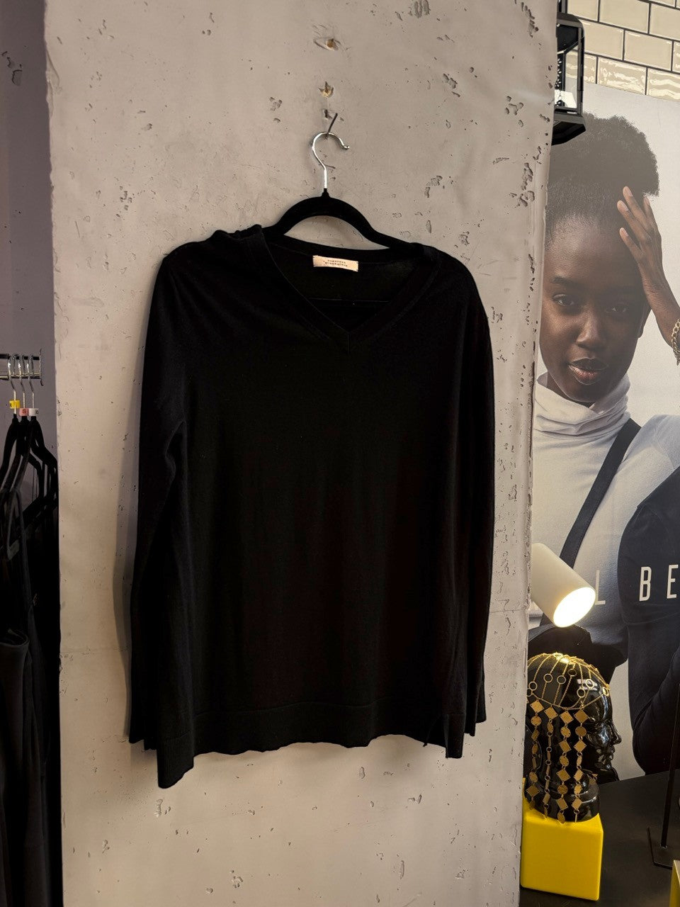 BERLIN VINTAGE CORNER Dorothee Schumacher merino sweater on a hanger